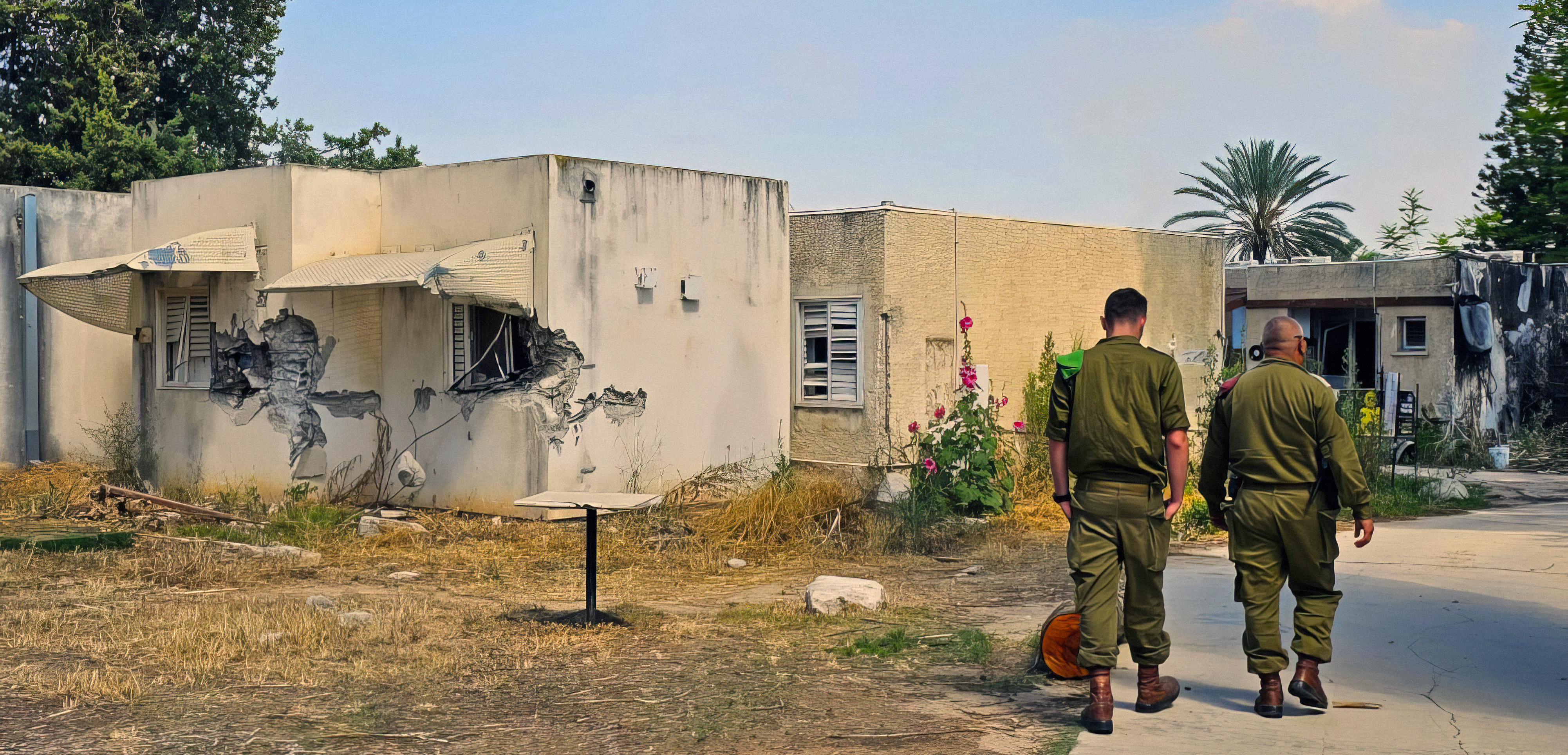 IDF tours kibbutz massacre site