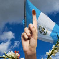 Ink-dipped finger of Guatemalan voter