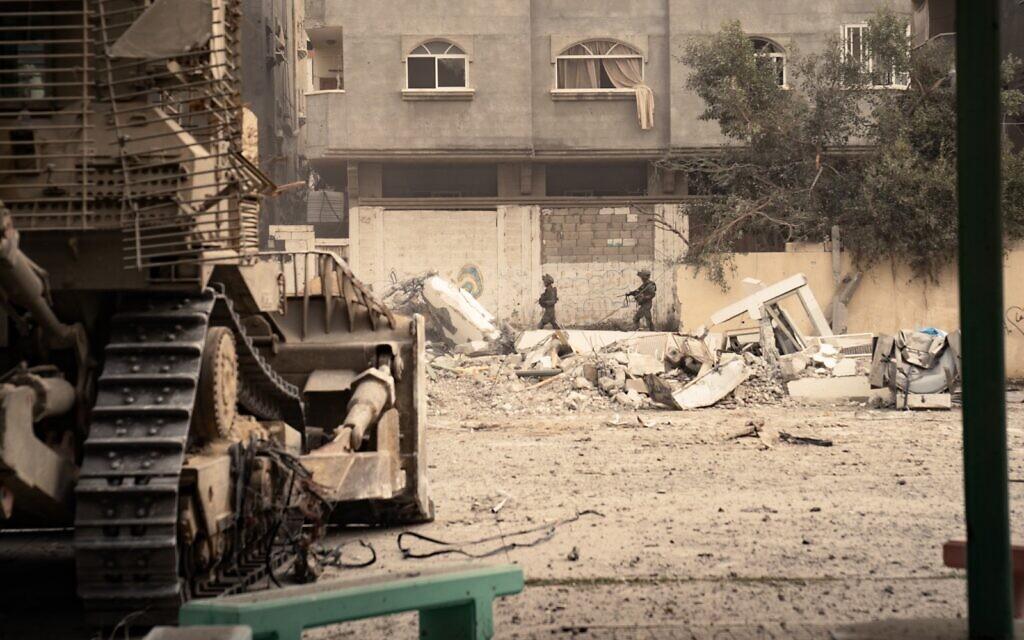 IDF photo of troops and dozer in Gaza